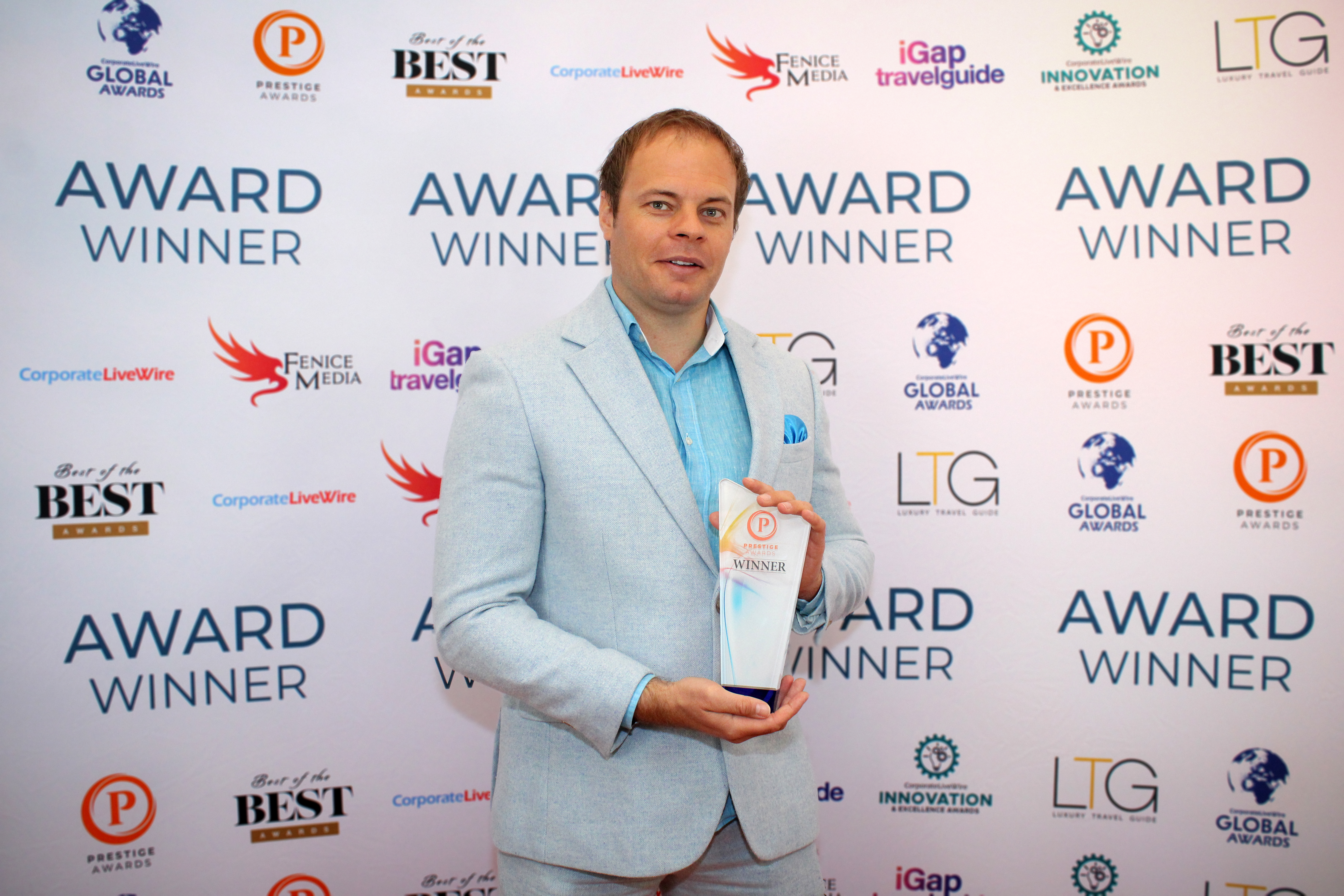 Ben Holmes with Prestige Award